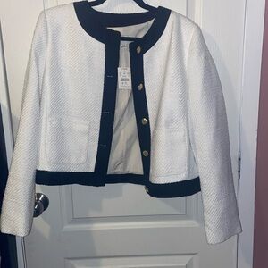 White with black trim gold buttons lady jacket